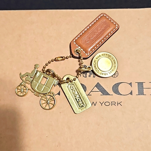 Coach Accessories - COACH EUC Carriage Charm and leather tag